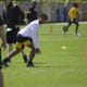 Calvin Austin runs routes during practice.